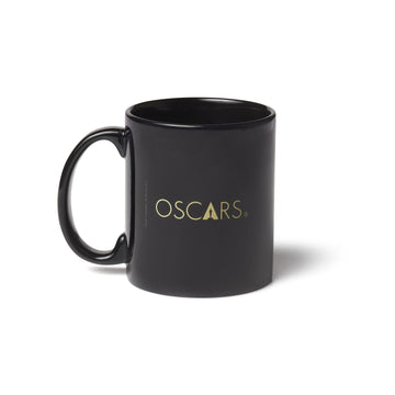 Black ceramic mug with gold Oscars logo